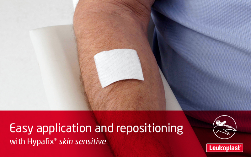 Here we demonstrate that Hypafix skin sensitive is easy to apply and reposition even on fragile skin: the hands of an HCP apply a wound dressing to a patient's forearm, lift it again and readjust it.  Here we demonstrate that Hypafix skin sensitive is easy to apply and reposition even on fragile skin: the hands of an HCP apply a wound dressing to a patient's forearm, lift it again and readjust it.